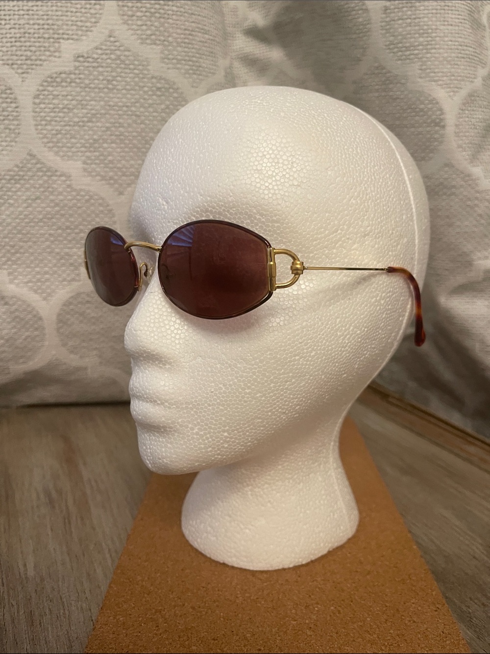 Gucci Oval Gold Frame Sunglasses with Brown Lenses